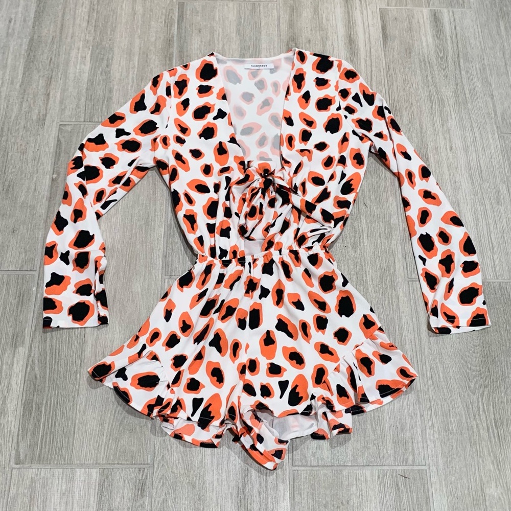 Glamorous orange and black romper